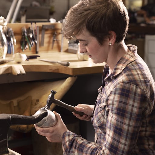 Jaeger-LeCoultre - Woman crafting metal during Homo Faber Followship program in her workshop